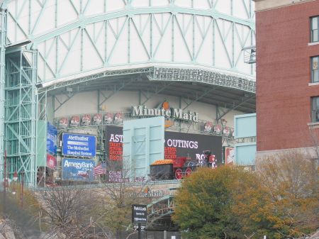 Minute Maid Park: 01/26/13 ... Here's the train! From the Crawford Street side, the Union Station memorial train is clearly visible and we still get a partially blocked, once inviting view of the interior scoreboard.