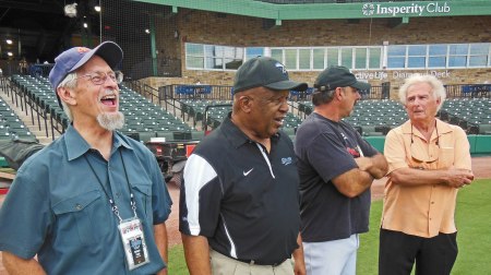 Watching Charlie Pride pound the ball are: Michael Point, a writer for the Corpus Christi Hooks, Deacon Jones, Skeeters Manager Gary Gaetti, and Skeeters Special Advisor Tal Smith. The hits just rang and rang and rang.