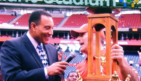 UH Coach Tony Levine accepts semi-final (?) possession of the Bayou Bucket from Program MC Butch Alsandor on 9/21/2013 at Reliant Stadium.
