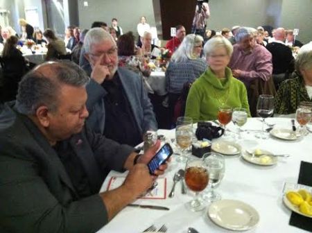 Sam Quintero, Bill McCurdy, and Marsha Franty share a quiet moment at the SABR table.