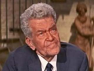 J.C. Flippen as R.E. "Bob" Smith