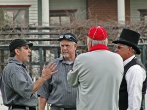 Dave Flores (L) of Katy and the Blind Tom (R) go over the rules with Mike McCroskey (back turned).