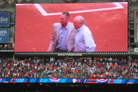 Nolan Ryan threw out the first pitch to Craig Biggio. All they needed was mike man Bob Uecker to call the location of the throw. - by Bob Dorrill
