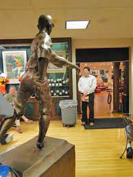 Anterior view of the Dickie Kerr staue and base, as it appeared on display at the now closed Houston Sorts Museum that Finger Furniture operated for three generations before its closing for economic reasons.