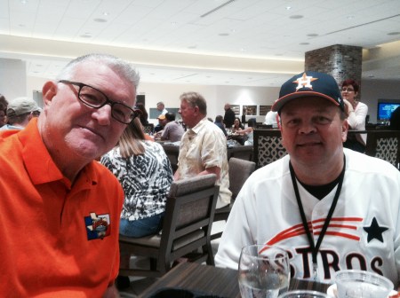 SABR friends Tom Plemons and Jan Larson enjoy a quiet discussion in between the parade of presentations.