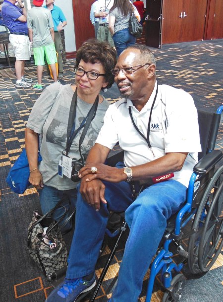 Jimmy "The Toy Cannon" Wynn poses for a photo with a fan.