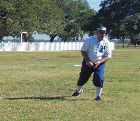 EXCITING ACTION! - In Game One,  Babies pitcher Larry Hajduk snares a comebacker and prepares to make the throw to first. - Had it been caught, it would have been an out.