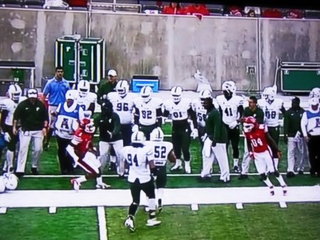 ~ THE UGLY ~ CHECK OUT THE CONCRETE BACKGROUND WALLS THAT KEEP SHOWING THEIR UGLY FACE OF TEDECU ON TV. - TOO BAD OUR UH CONSTRUCTION BUDGET DID NOT INCLUDE FUNDS FOR SOME FOR SOME KIND OF ALL WEATHER PAINT.