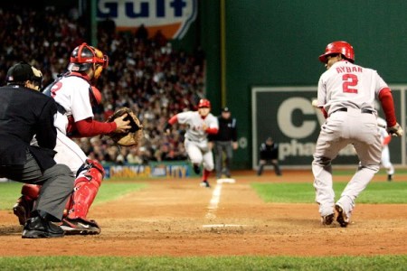 If that's the ball the catcher is gripping in his glove, it lokos like this squeez play is well on its way to suicide.