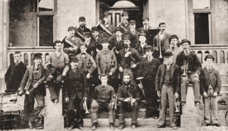 The Langholm, Scotland  Brass Band probably never came to Houston , but their dress style and selection of instruments was typical of musical groups from that era.     A news story from the always helpful and generous Darrell Pittman.