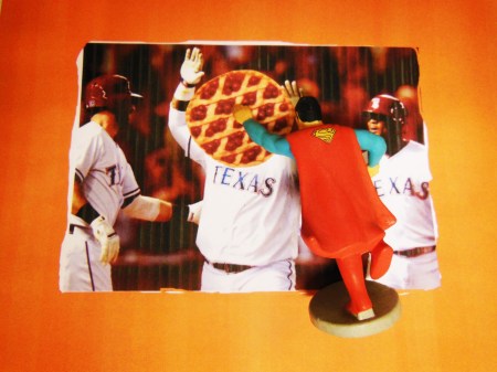 SUPERMAN, THE ASTROS #1 SUPERFAN, DELIVERS A "PIE TRAINER" BLOW TO THE FACE OF PRINCE FIELDER'S FACE IN THE HOPE THAT IT MAKES THIS CALL TO SPECIFICALLY CLEAR TO THE ASTROS AND THEIR SUPERFANS WHAT NOW IS NEEDED!